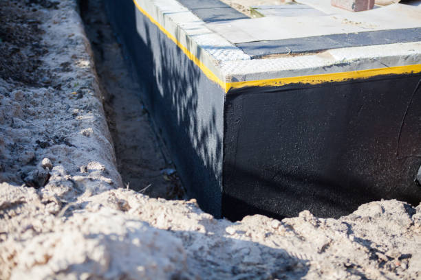 Professional Basement Waterproofing technician working in Parsippany, NJ